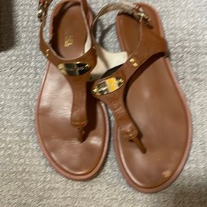 Michael Kors sandals with gold embellishment